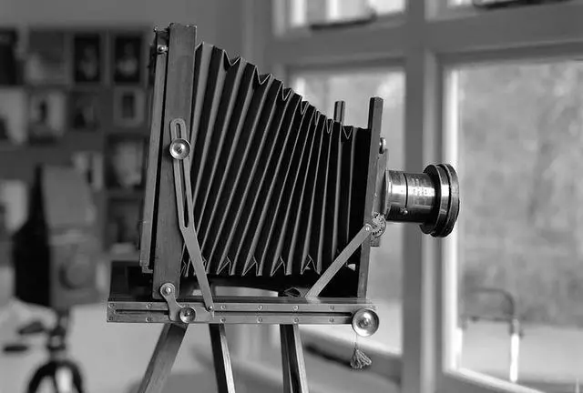 Old Camera, Grey, Camera pointing out of the window